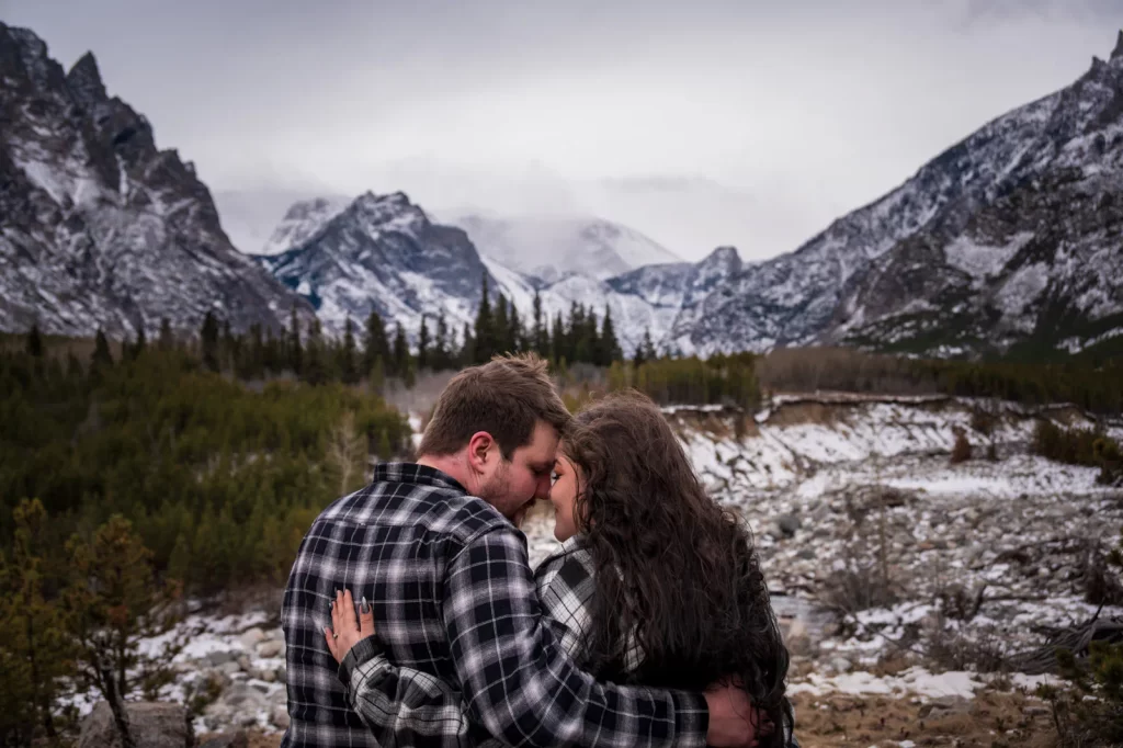 Couple in front of Beartooth Mountains Montana Engagement portrait