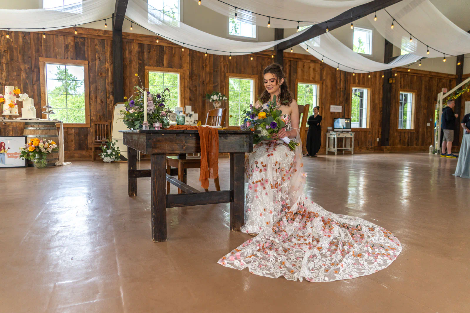 Bride on cute furniture at Montana Wildlflower Venue in Red Lodge, Montana