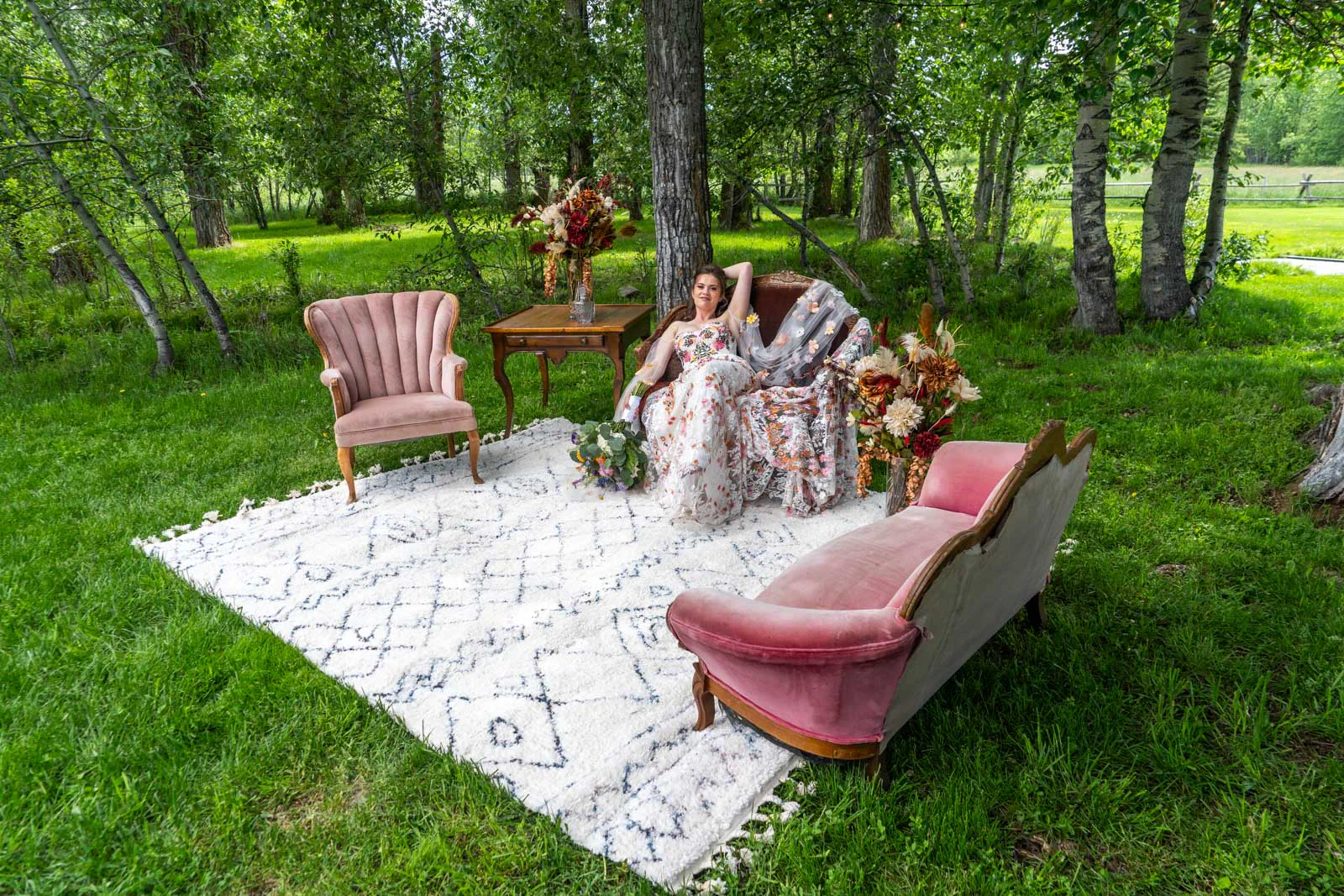 Bride on cute furniture at Montana Wildlflower Venue in Red Lodge, Montana