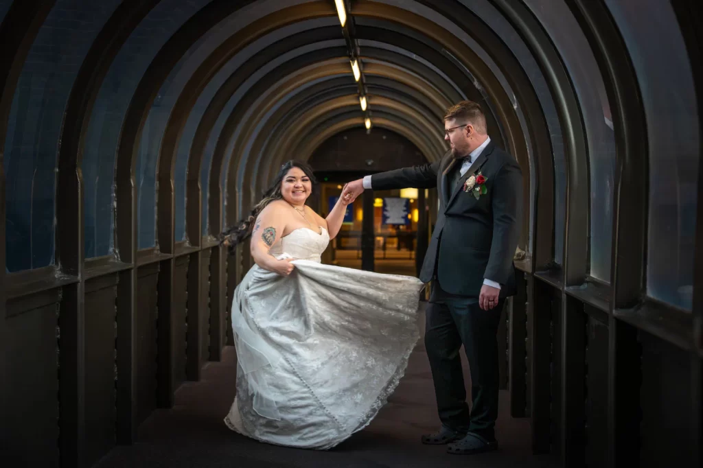 Bride and groom dancing in tunnel Doubletree by Hilton Montana