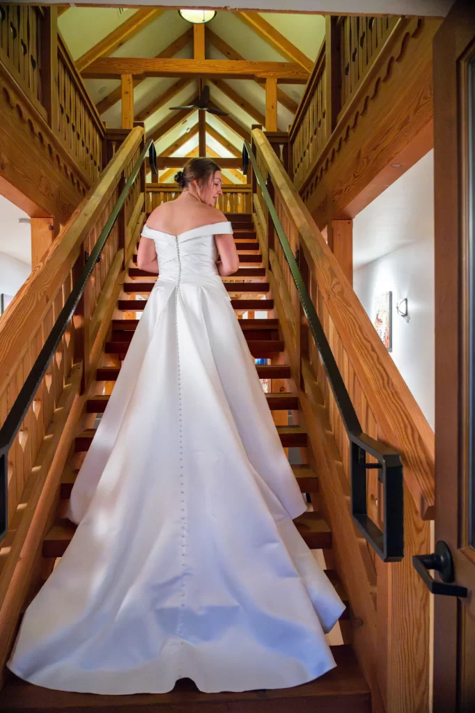 Bride long dress portrait on stairs