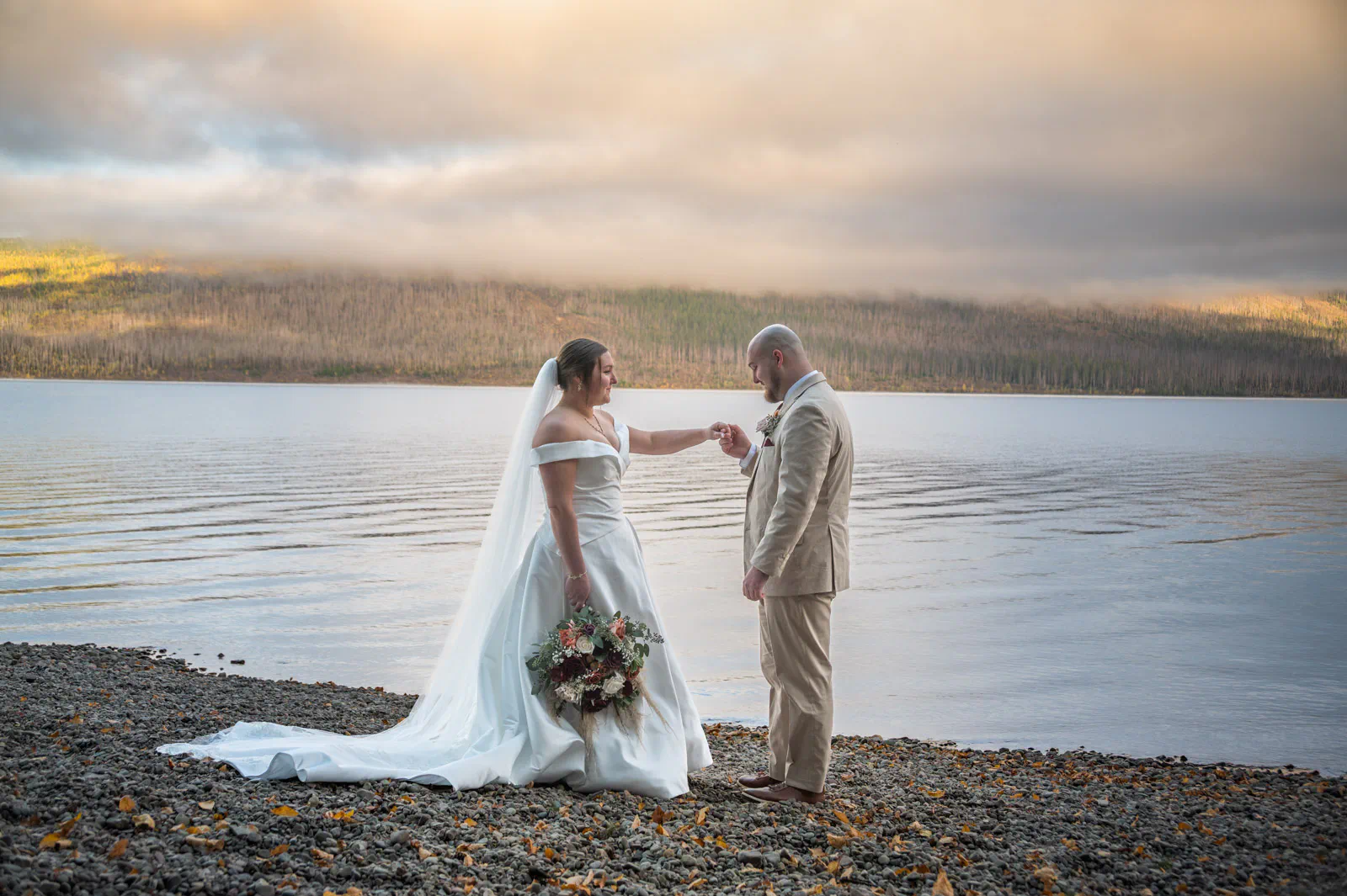 Wedding couple Lake McDonald Montana Glacier National Park