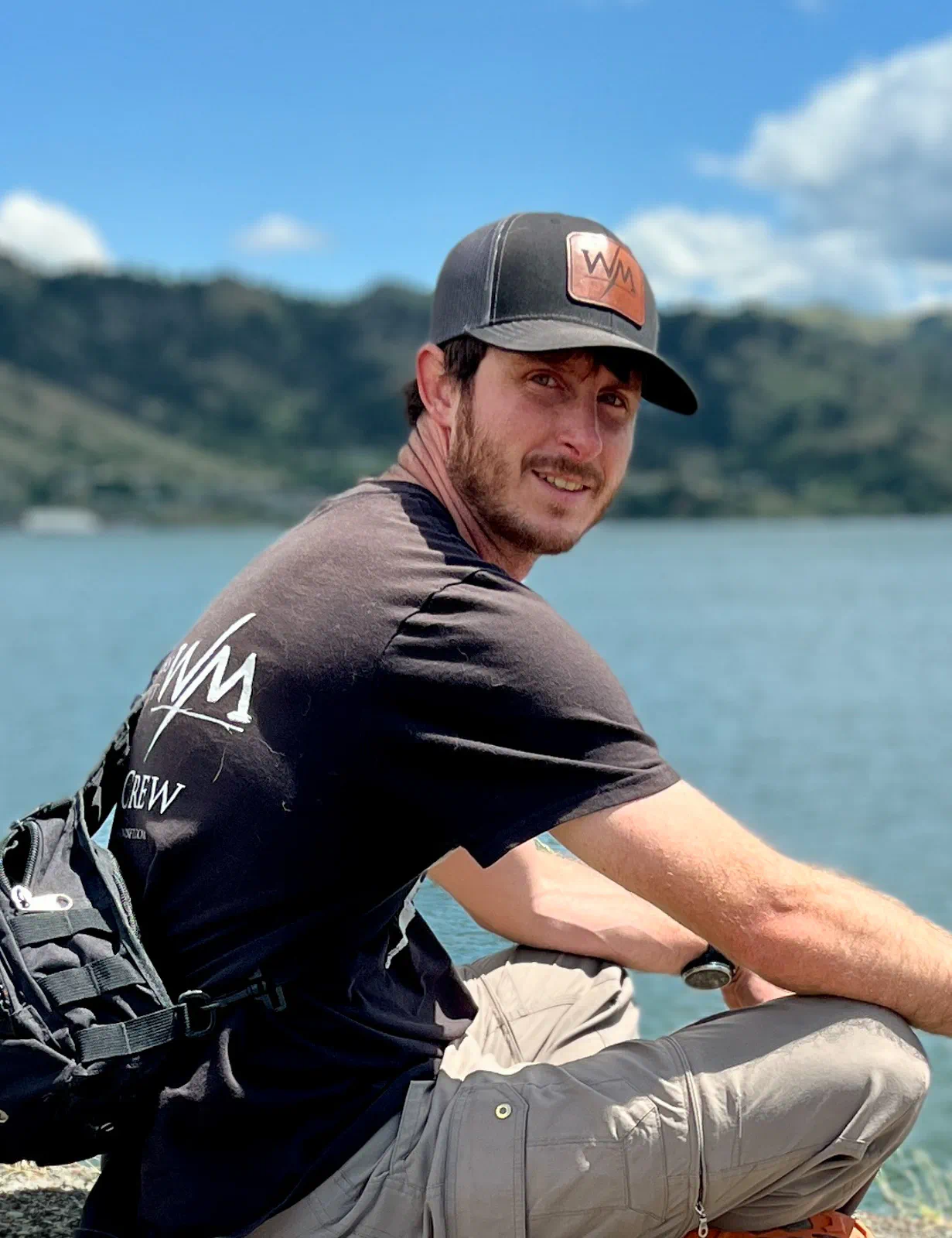 Videographer portrait by lake