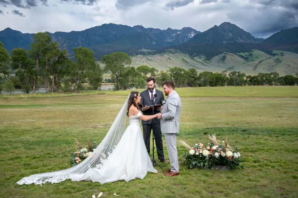 Destination wedding ceremony in front of Absaroka Mountains, Montana