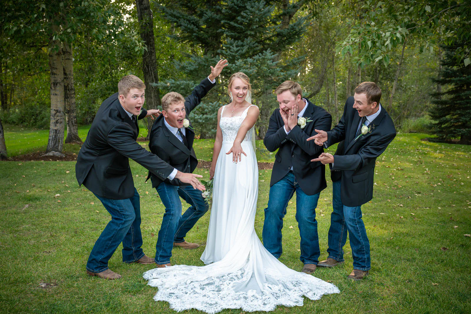 Bride and groomsmen portrait funny at Rockin TJ Ranch