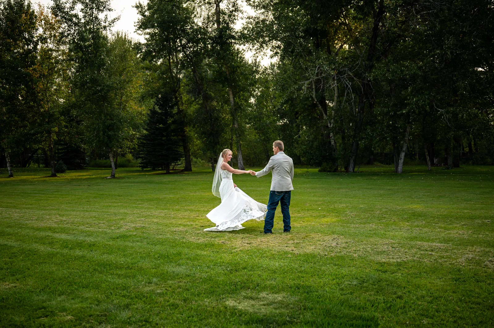 Couple dancing on lawn at Rockin TJ Ranch, Bozeman, Montana