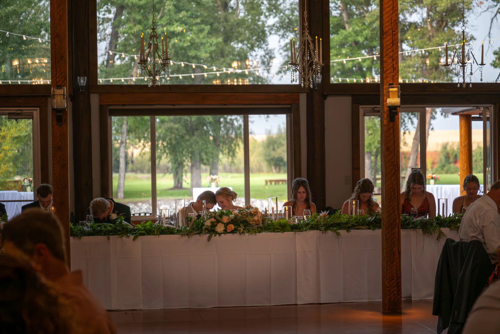 Couple at head table at Rockin TJ Ranch, Bozeman, Montana