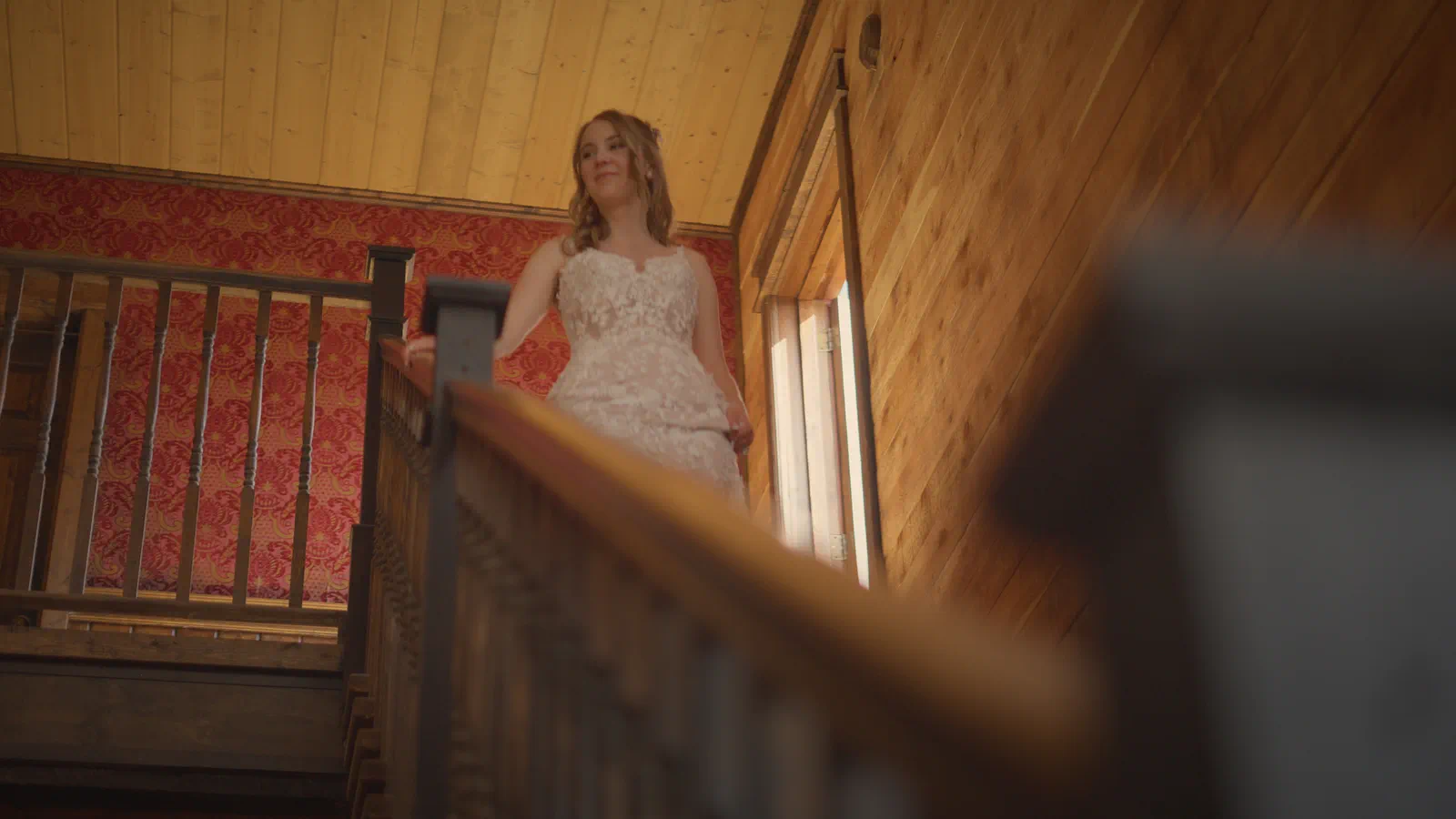 Bride coming down stairs at Yellowstone Film Ranch, Montana