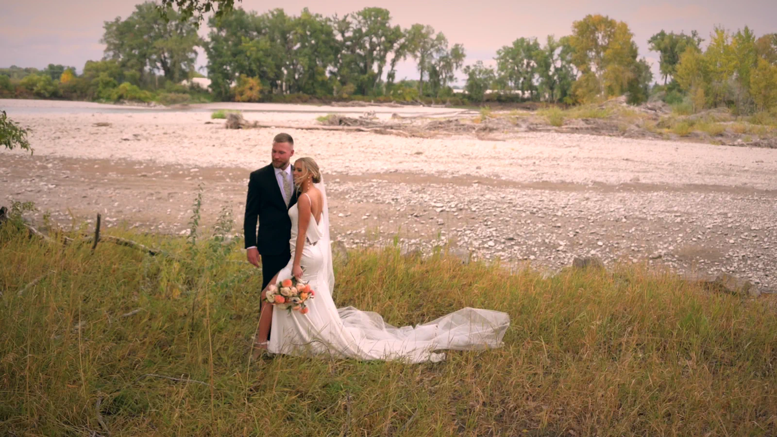 Emily Luke Wedding final 23-10-13_00_03_15;13_result Couple by Yellowstone River at Swift Creek Resort, Billings, Montana