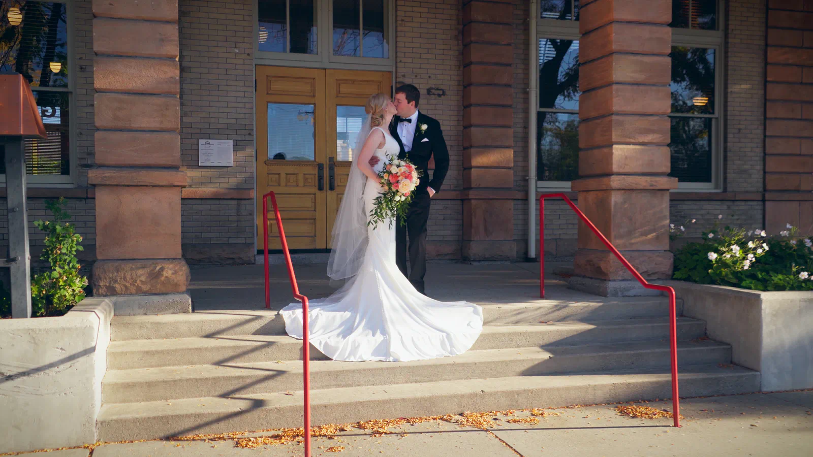 Full simple edit _00_28_12;10_result Couple kissing at entrance of Billings Depot, Montana