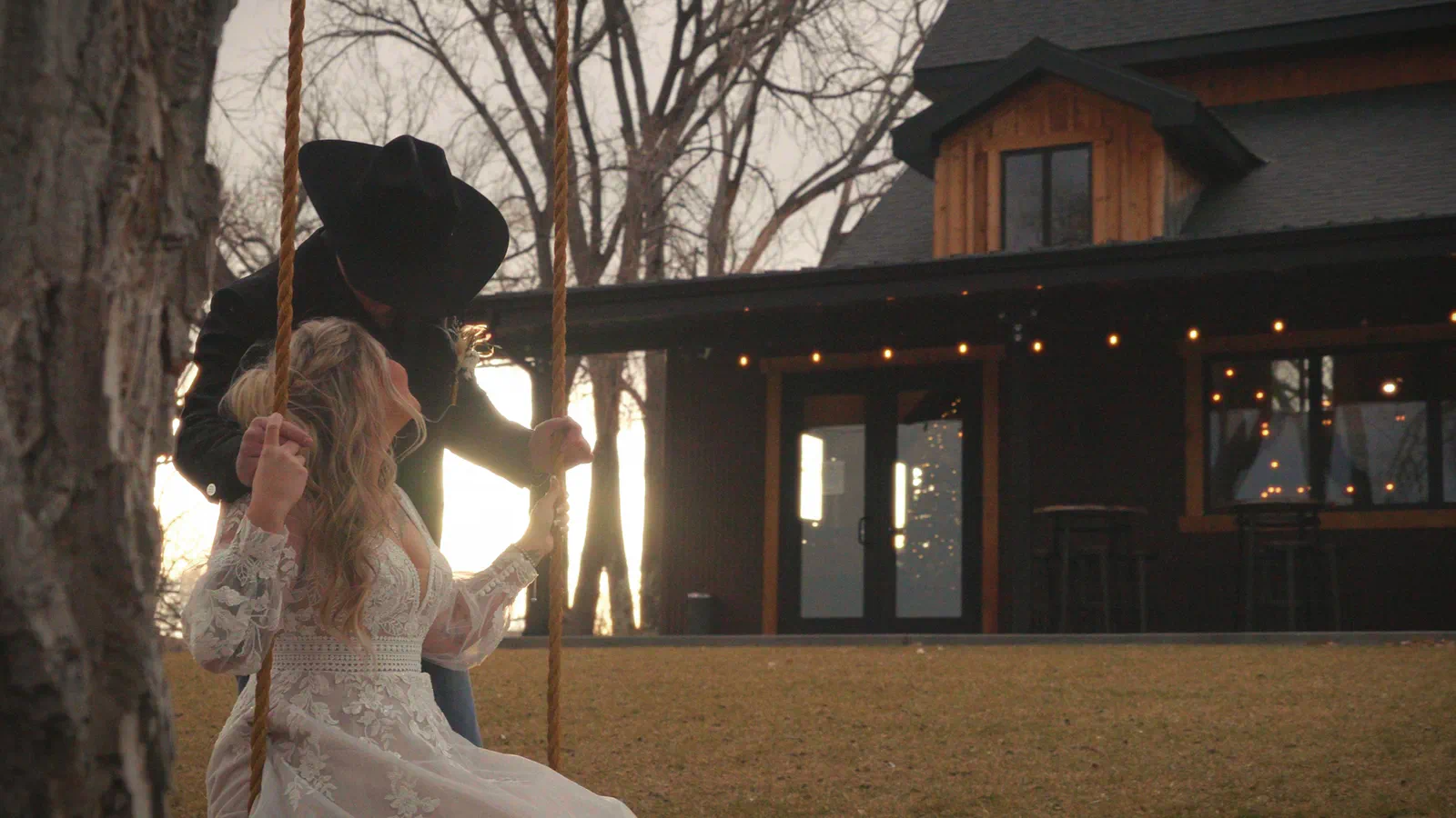 Couple on swing at Camelot Ranch, Billings, Montana
